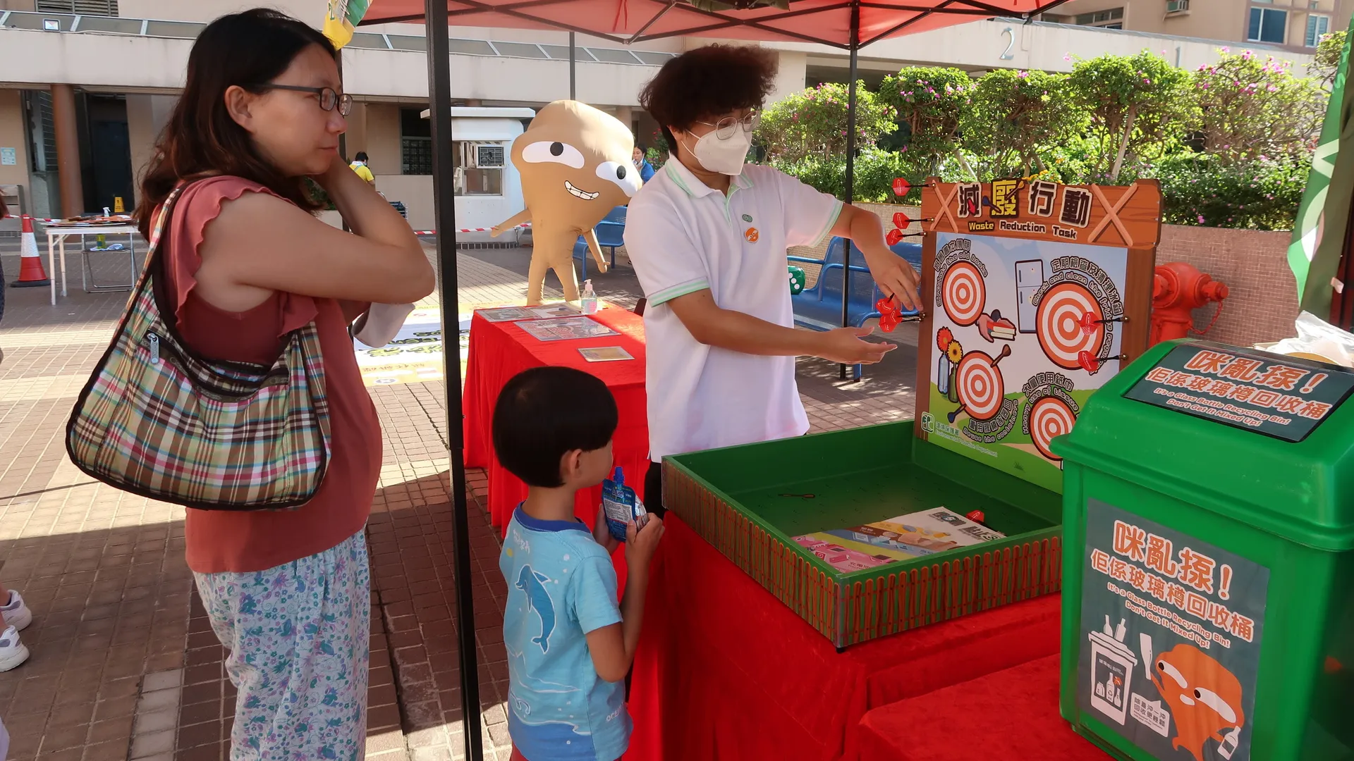 Residents taking part in the game booths managed by Green Outreaching Team