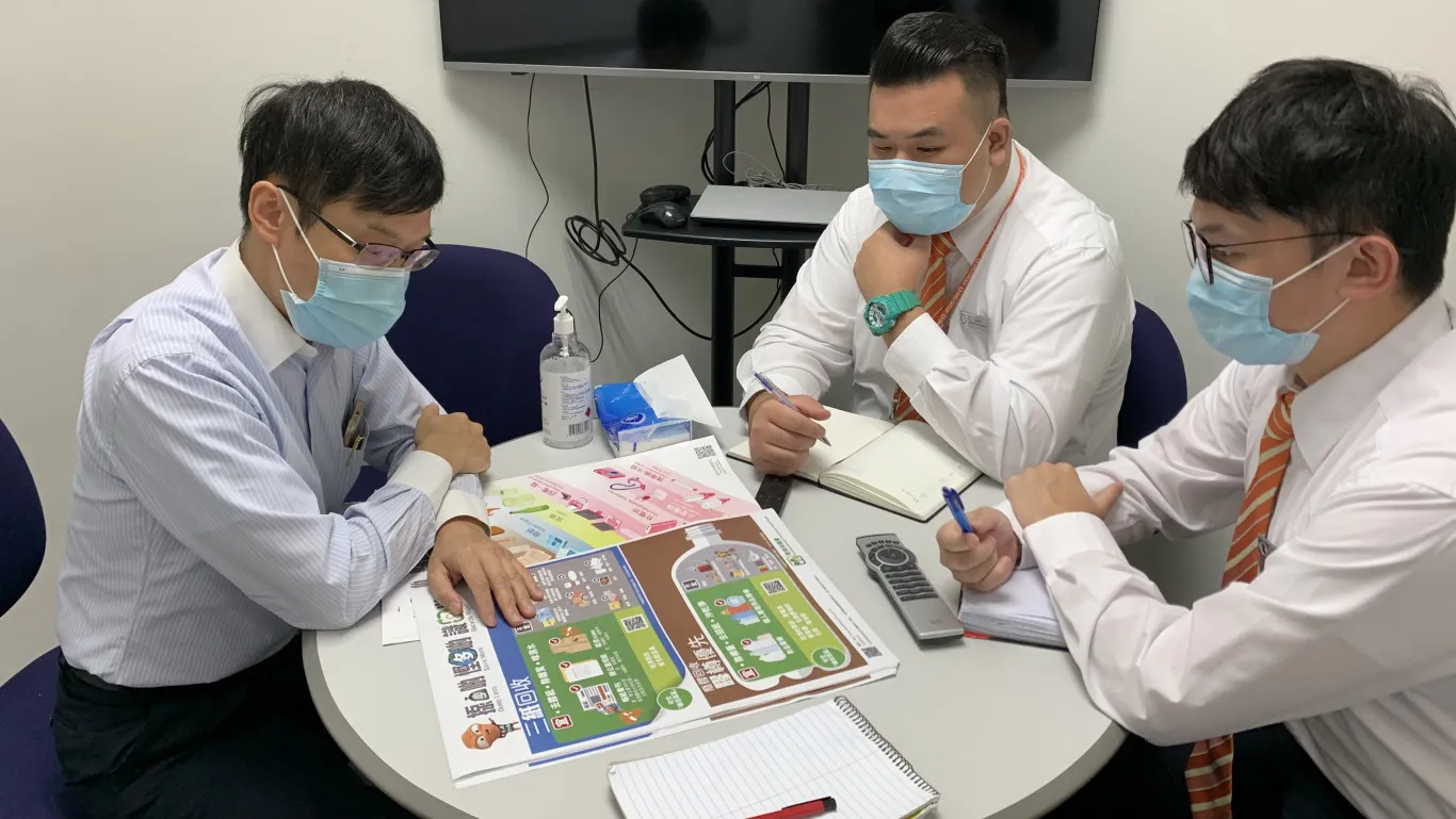 Green Outreaching Team providing advice on clean recycling